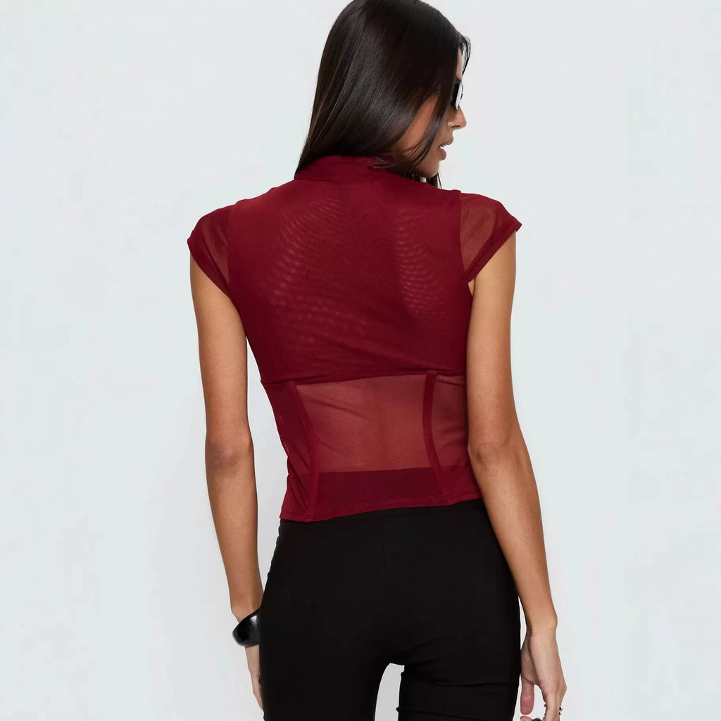 Princess Polly, a high-end and sexy queen, features a combination of wine and red stitching, with a perspective of abstinence. She has a half height stand up collar and short sleeves in wine and red