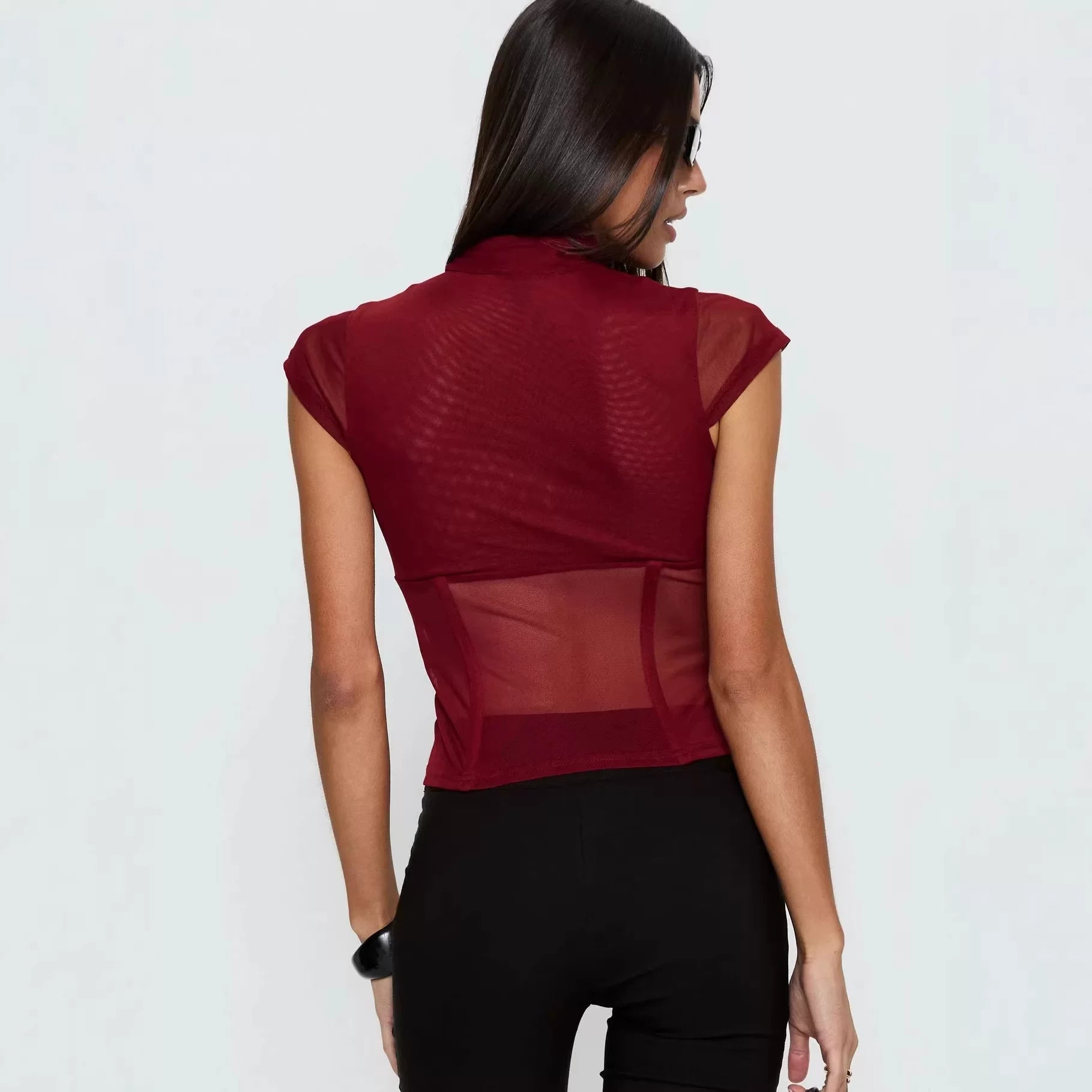 Princess Polly, a high-end and sexy queen, features a combination of wine and red stitching, with a perspective of abstinence. She has a half height stand up collar and short sleeves in wine and red