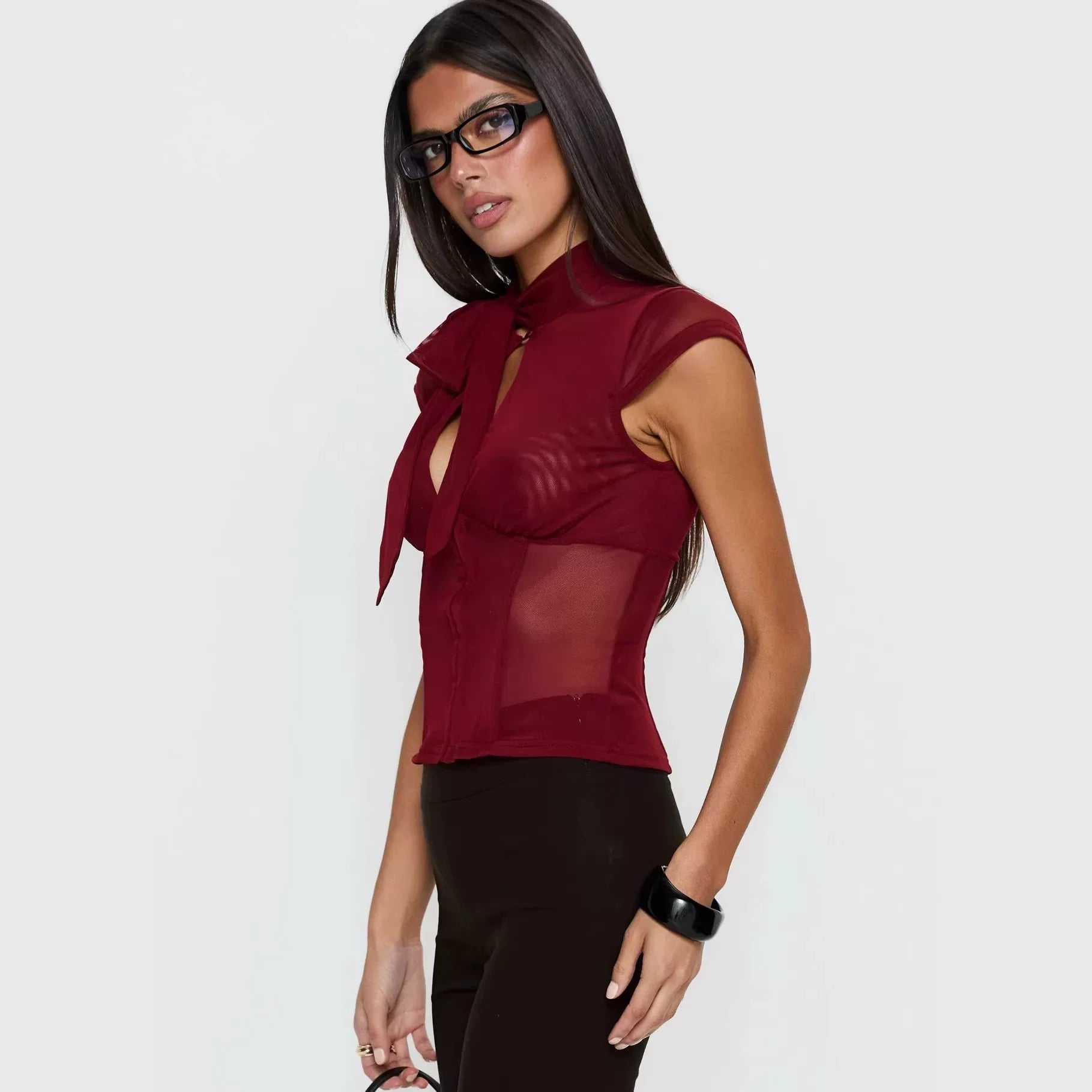 Princess Polly, a high-end and sexy queen, features a combination of wine and red stitching, with a perspective of abstinence. She has a half height stand up collar and short sleeves in wine and red