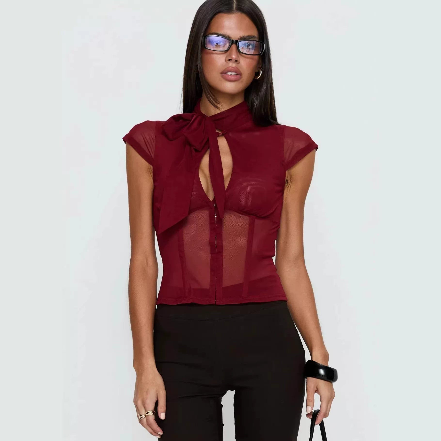 Princess Polly, a high-end and sexy queen, features a combination of wine and red stitching, with a perspective of abstinence. She has a half height stand up collar and short sleeves in wine and red